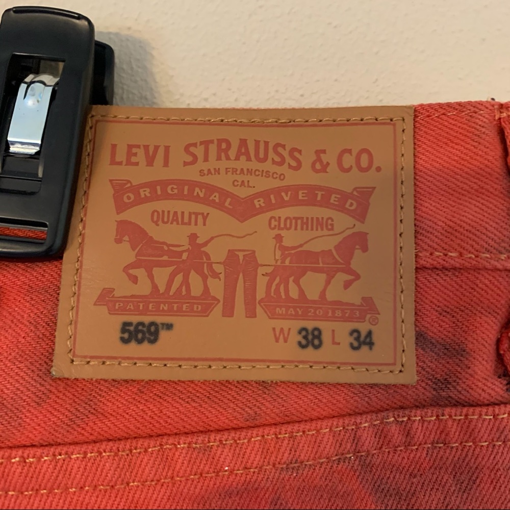 Men’s grunge splatter paint Levi’s 569 jeans